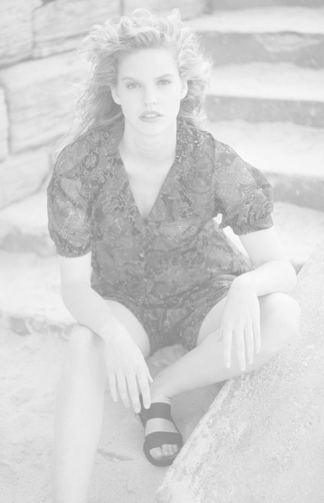 Model portfolio package details, Female model at beach location for a modelling portfolio fashion shoot background - image package 2